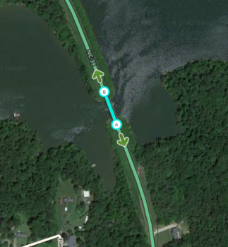 Good: This bridge was cut because it is a rural, two-way segment over water (it would also qualify under the first exception for nearby destinations, due to the driveway to the south).